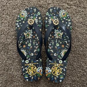 Tory Burch Black Floral Flip Flops